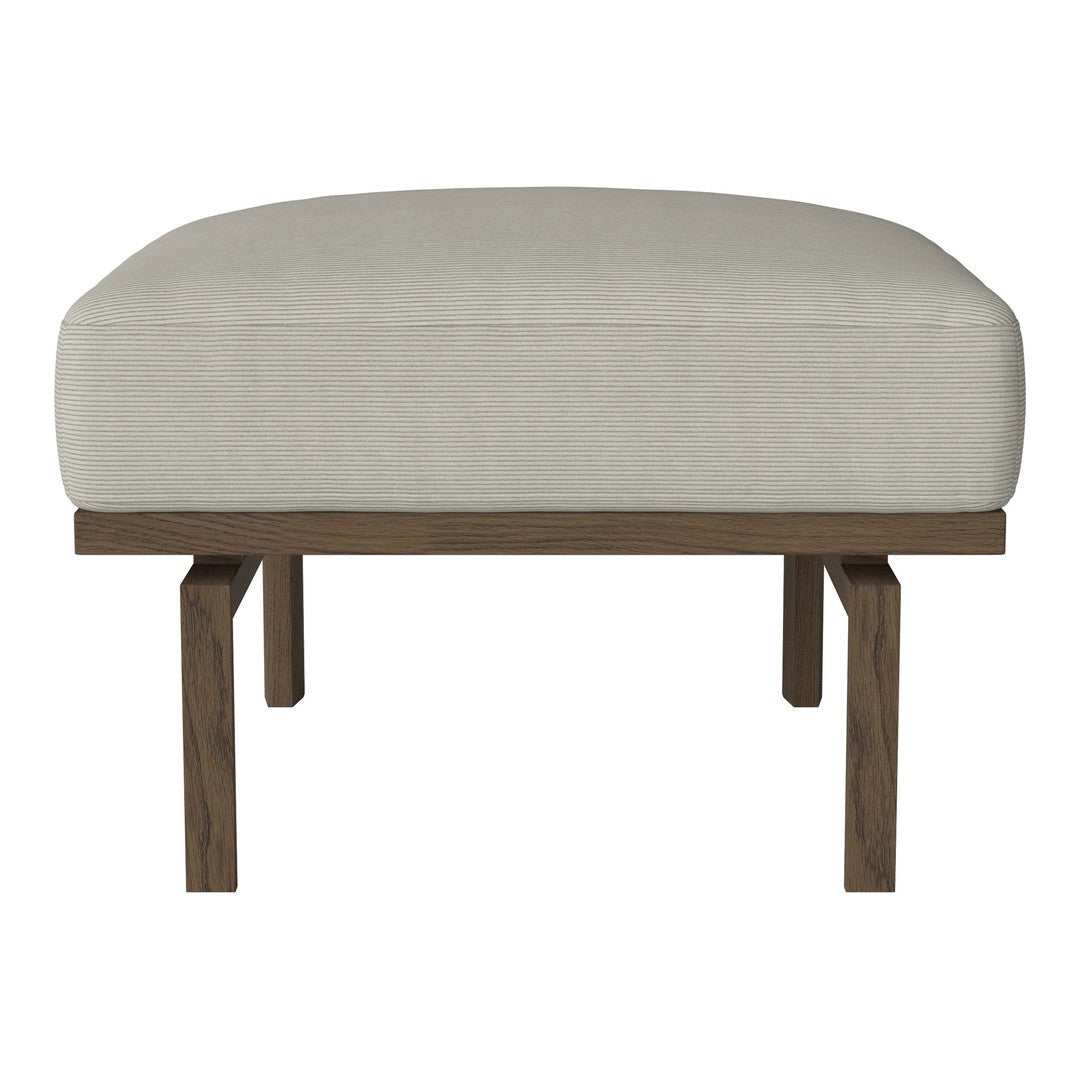 Cream fabric ottoman with a sleek, minimalist design and warm wood legs. Perfect for versatile home decor.