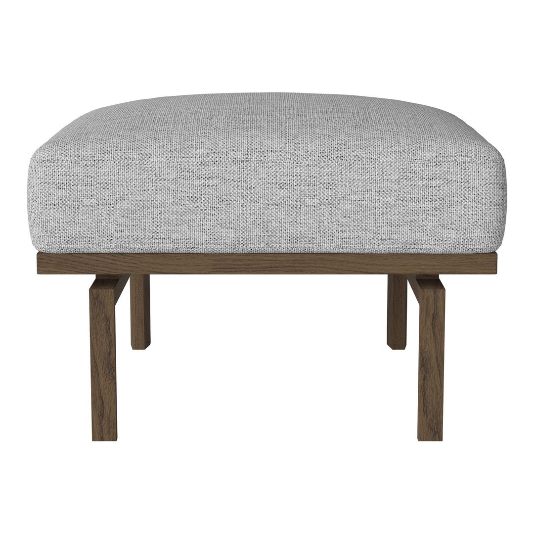 Gray upholstered ottoman with a smooth texture, supported by a dark wooden frame. Perfect for modern decor.