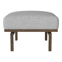 Gray upholstered ottoman with a smooth texture, supported by a dark wooden frame. Perfect for modern decor.