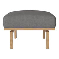 Gray upholstered ottoman with a smooth texture and light wood legs, featuring a minimalist design. Ideal for modern decor.