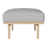 Gray upholstered ottoman with a smooth texture on a light wood frame. Ideal for modern decor.