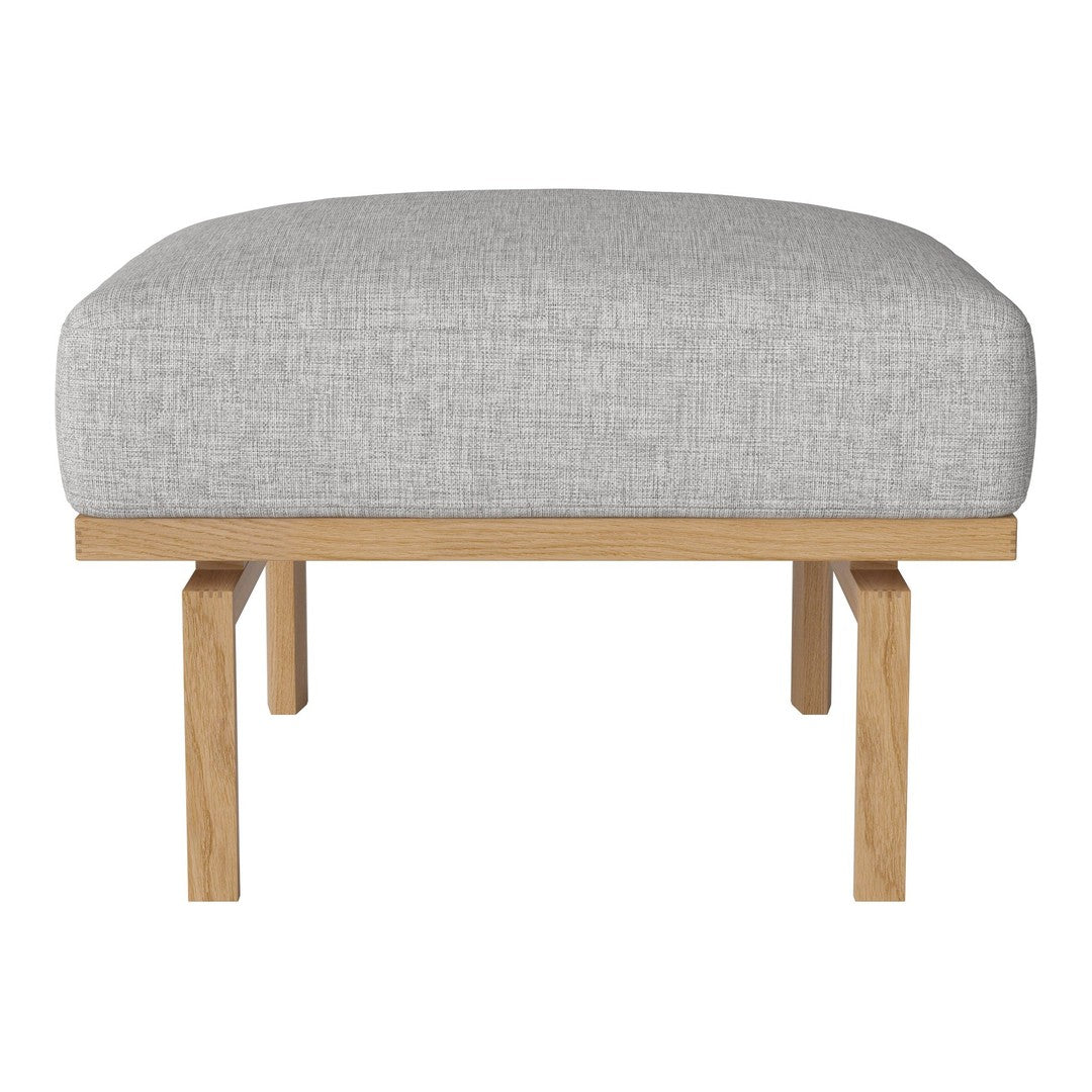 Light gray upholstered ottoman with a simple texture, featuring natural wooden legs for a modern look.