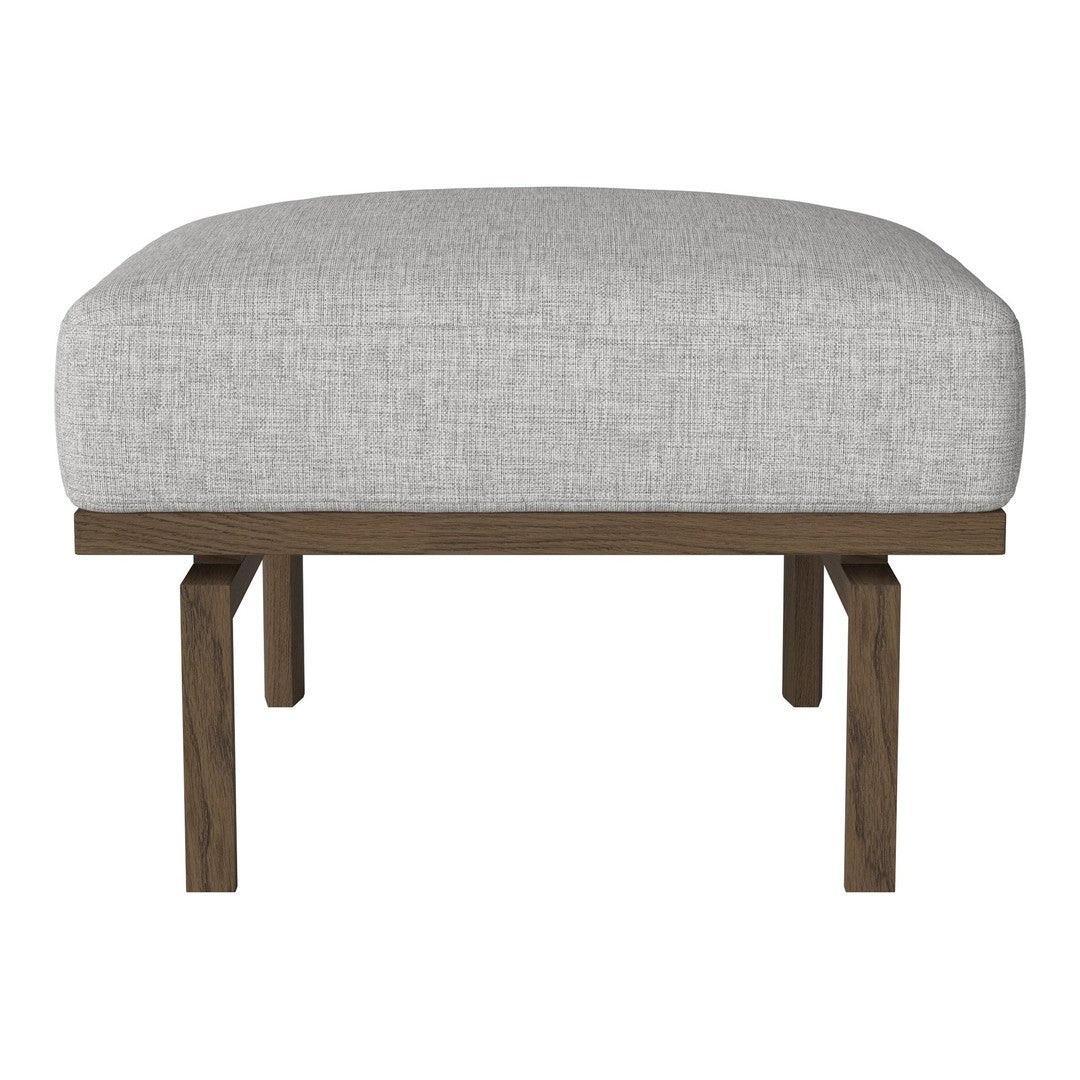 Light gray fabric ottoman with a simple, clean design and dark wood legs, perfect for modern decor.