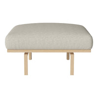 Light gray cushioned ottoman on a natural wood base, featuring a smooth, minimalistic design.
