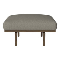 Gray upholstered ottoman with subtle texture, featuring a wooden frame and minimalistic design.