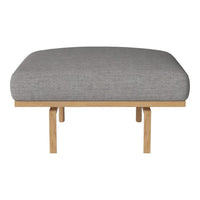 Gray cushioned bench seat with a smooth texture, supported by natural wood legs, perfect for modern decor.