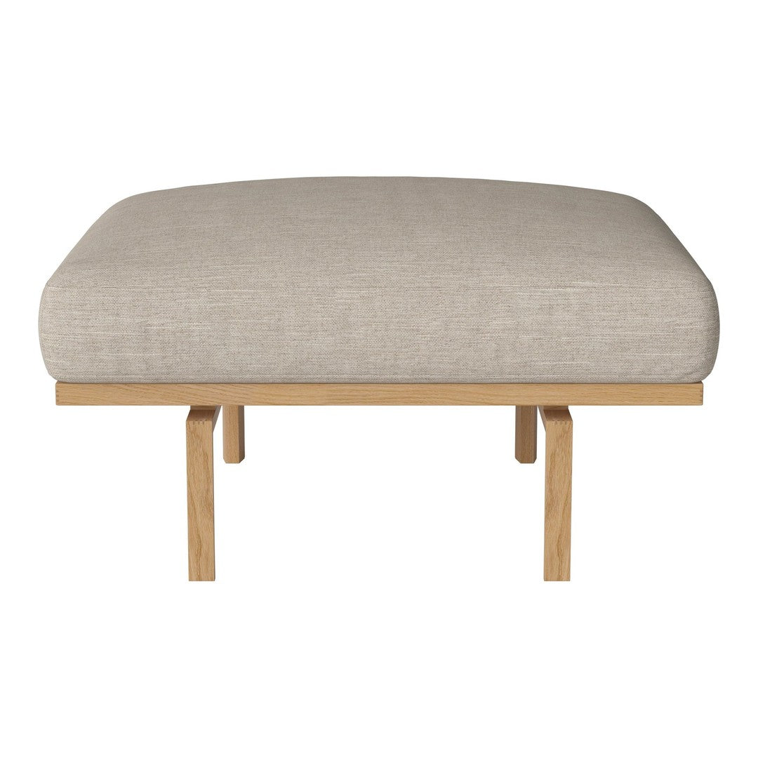 Beige upholstered cushion with smooth texture on a light wooden frame. Simple, modern design ideal for any decor.