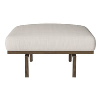 Beige cushioned bench with smooth fabric upholstery and a simple wooden frame. Elegant and minimalist design.