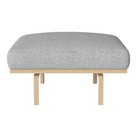 Gray upholstered cushion with a textured pattern on a natural wood base, minimalist design perfect for modern decor.