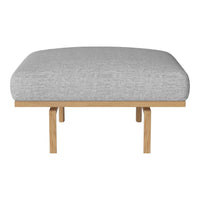 Light gray textured cushion with a smooth finish, supported by natural wood legs.