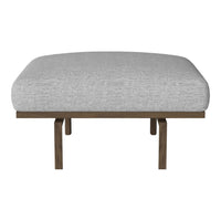Gray upholstered cushion with a textured finish on a simple wooden frame. Modern and minimalist design.