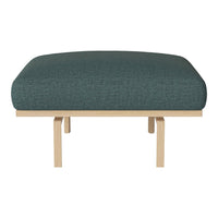 Teal upholstered ottoman with a smooth texture and wooden legs, offering a modern and minimalist design.