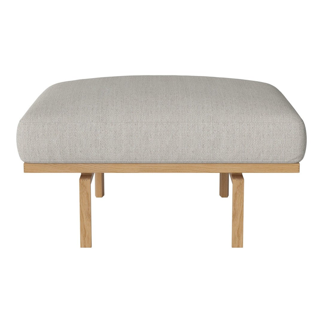 Light gray upholstered cushion with a smooth fabric texture, paired with natural wood legs.