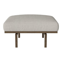 Light beige cushion with a smooth texture on a wooden base. Perfect for modern decor.