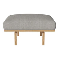 Light gray upholstered ottoman with a smooth texture and natural wood legs for a modern look.