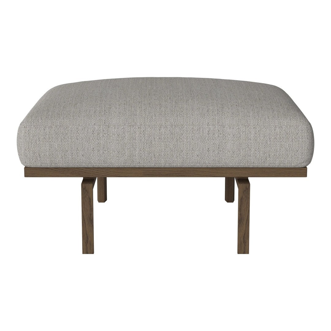 Light gray fabric cushion atop a sleek wooden base, featuring a smooth, minimalist design. Perfect for modern decor.