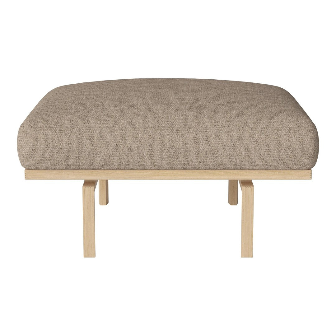 Beige upholstered bench cushion with a smooth texture atop a light wooden frame. Simple and modern design.