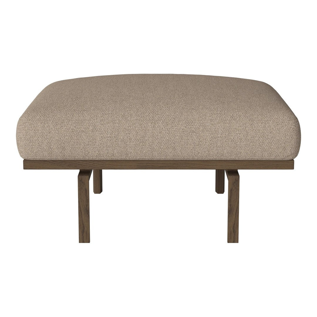 Beige upholstered stool with a smooth texture and a minimalist wooden frame. Perfect for modern decor.