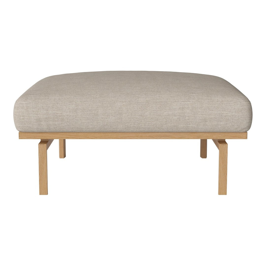 Beige linen cushion on a light wood frame, featuring a minimalist, sleek design and soft, rounded edges.