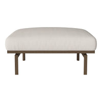 Beige upholstered ottoman with smooth, minimalist design and sturdy brown metal frame.