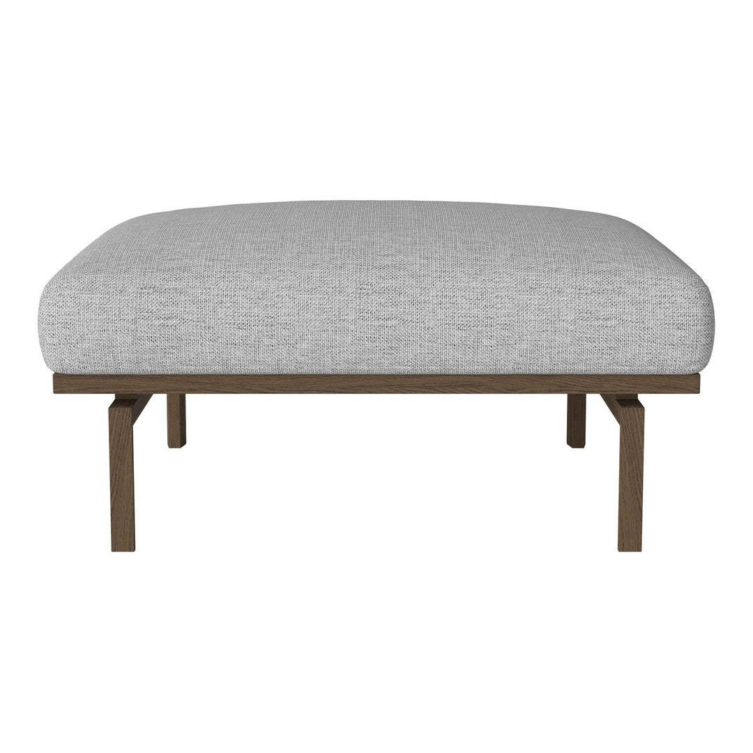 Grey upholstered ottoman with a textured finish and warm wood legs, perfect for modern decor.