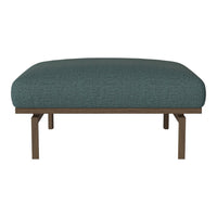 Teal upholstered ottoman with a textured fabric and a sleek, brown metal frame.