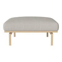 Light gray upholstered cushion with a smooth texture, set on a natural wood frame. Minimalist and modern design.