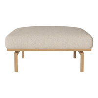 Cream fabric upholstered ottoman with a smooth, textured surface and natural wood legs. Minimalist and modern design.