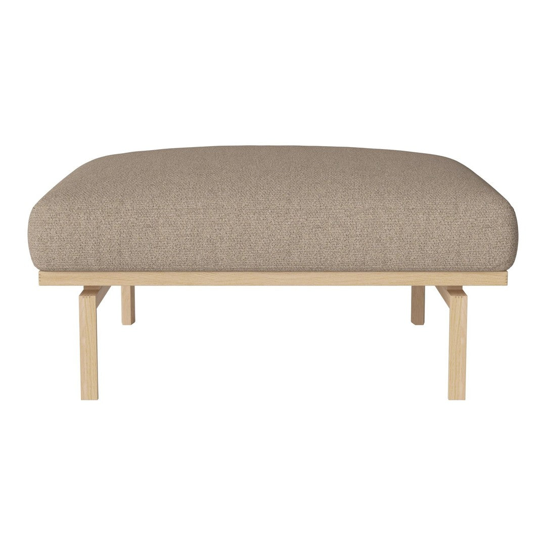Beige upholstered bench with a smooth texture and light wooden legs, perfect for minimalist decor.