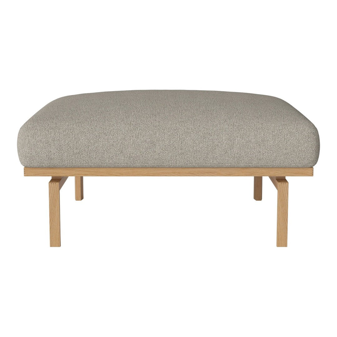 Gray upholstered bench seat with a smooth fabric finish and natural wood legs, offering a minimalist design.