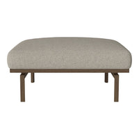 Beige cushioned ottoman with a smooth, textured fabric and sleek brown metal legs. Perfect for modern decor.