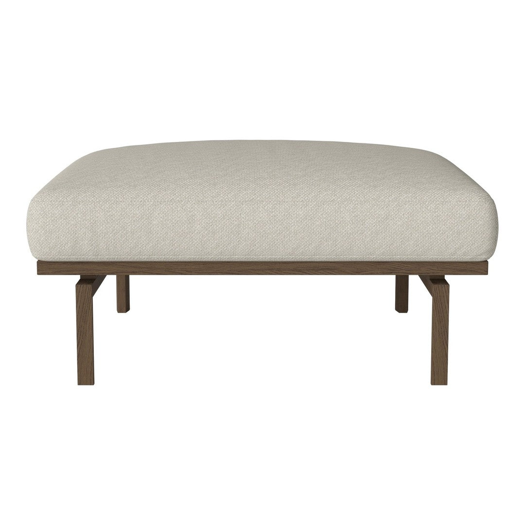 Light beige upholstered ottoman with a smooth texture and minimalist brown metal frame. Perfect for modern decor.