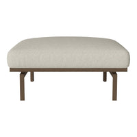 Light beige upholstered ottoman with a smooth texture and minimalist brown metal frame. Perfect for modern decor.