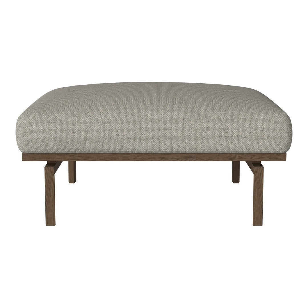 Beige upholstered ottoman with a smooth texture and wooden legs for a modern, minimalist look.