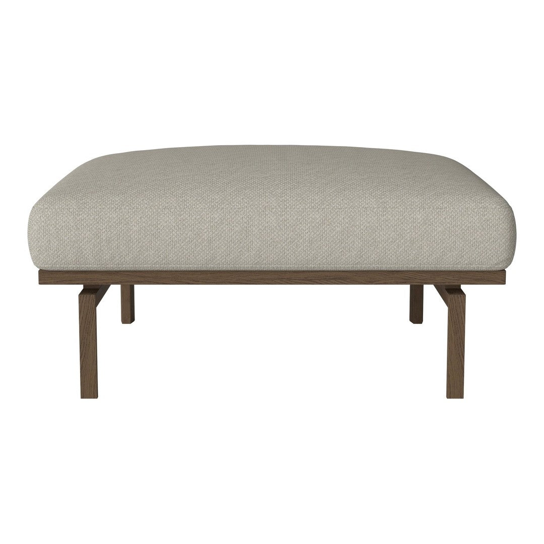 Beige upholstered ottoman with a smooth texture and minimalist design on a sleek brown metal frame.
