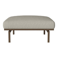 Beige upholstered ottoman with a smooth texture and minimalist design on a sleek brown metal frame.