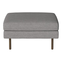 Gray upholstered ottoman with a smooth texture and minimalist design, featuring slender metal legs.