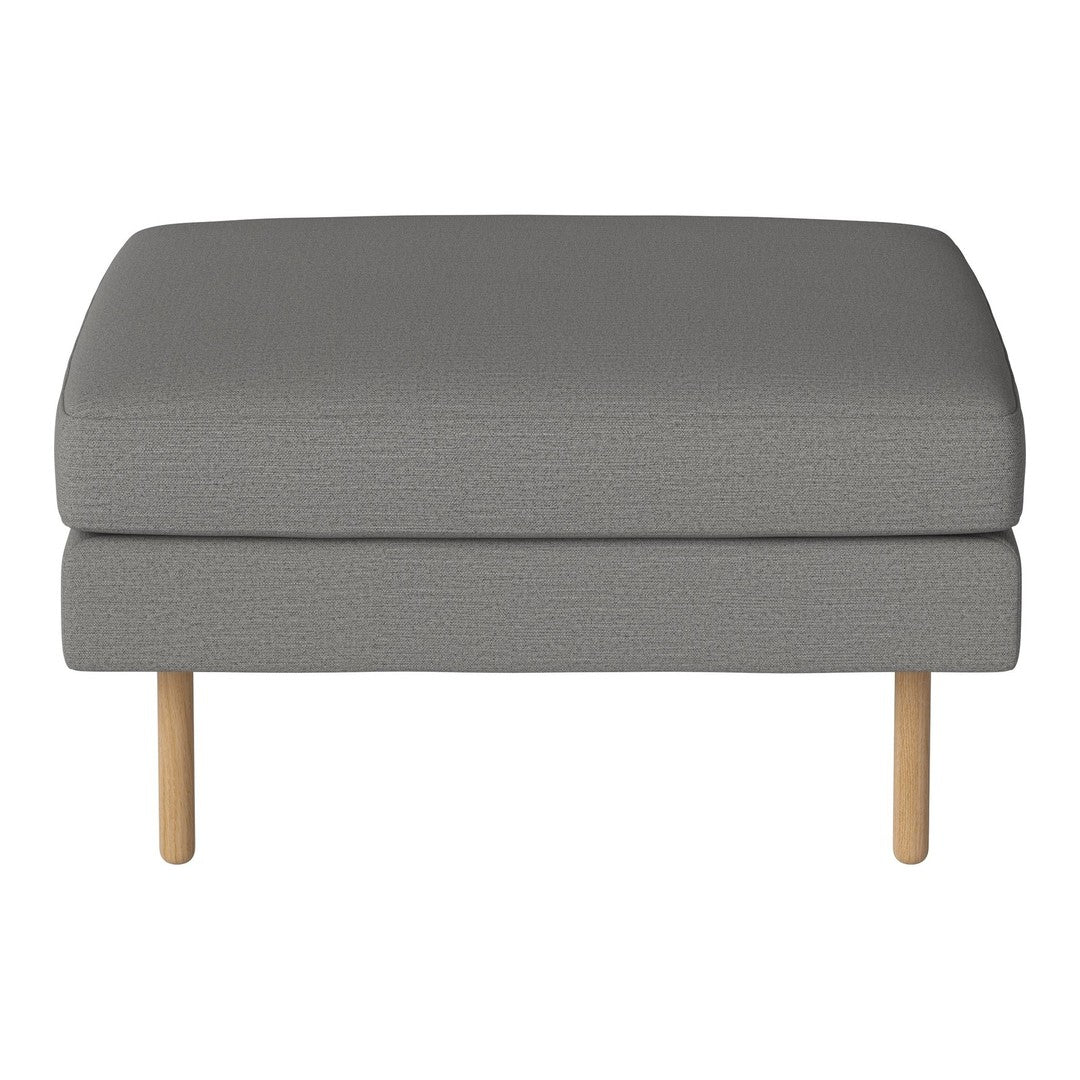 Gray upholstered ottoman with a textured pattern and light wooden legs. Ideal for modern décor.
