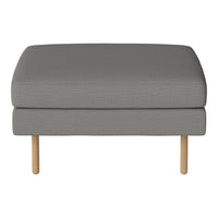 Gray upholstered ottoman with a textured pattern and light wooden legs. Ideal for modern décor.