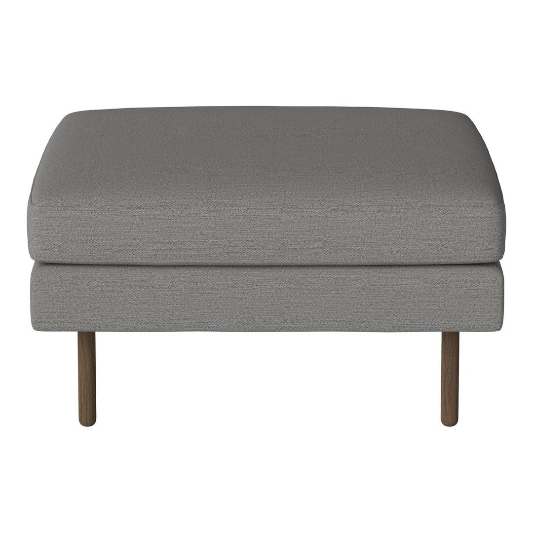 Gray upholstered ottoman with a smooth texture and wooden legs, perfect for modern decor.