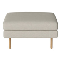Light beige upholstered ottoman with a smooth texture and light wood legs, perfect for versatile decor.