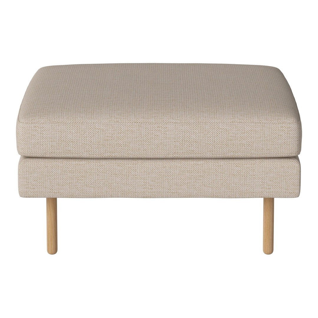 Beige ottoman with a smooth texture and light wooden legs, perfect for modern interiors.