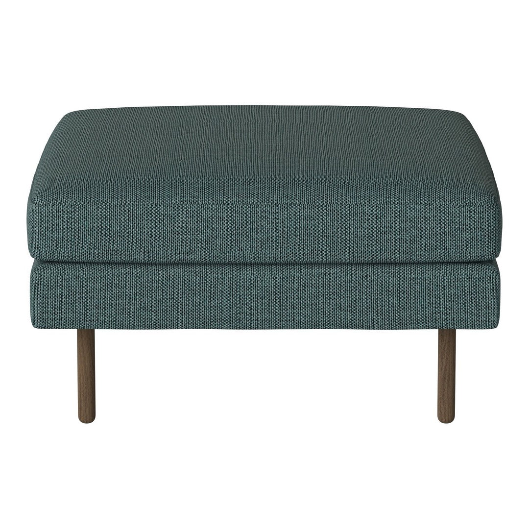 Teal upholstered ottoman with a subtle textured pattern and wooden legs, ideal for modern decor.