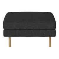 Black upholstered ottoman with a textured finish and natural wooden legs. Simple, modern design for versatile home decor.