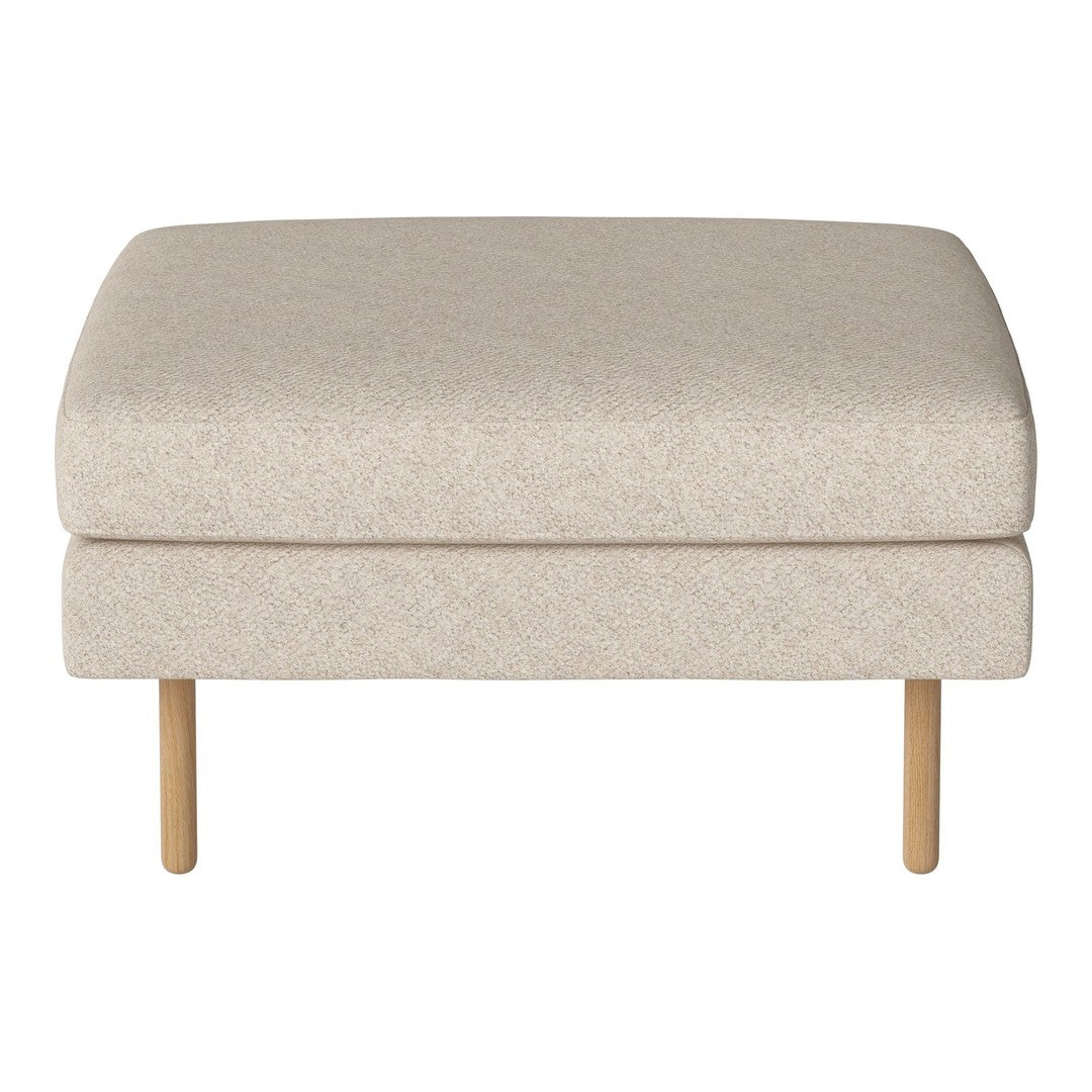 Beige upholstered ottoman with a soft texture and natural wooden legs, perfect for modern decor.