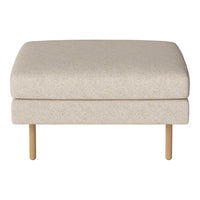 Beige upholstered ottoman with a soft texture and natural wooden legs, perfect for modern decor.