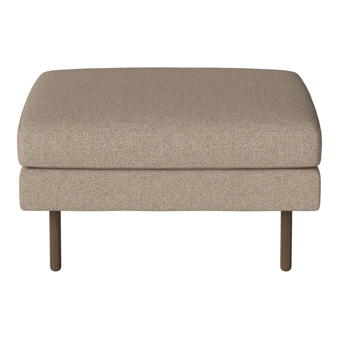 Beige upholstered ottoman with a smooth texture and simple design, featuring sleek metal legs.