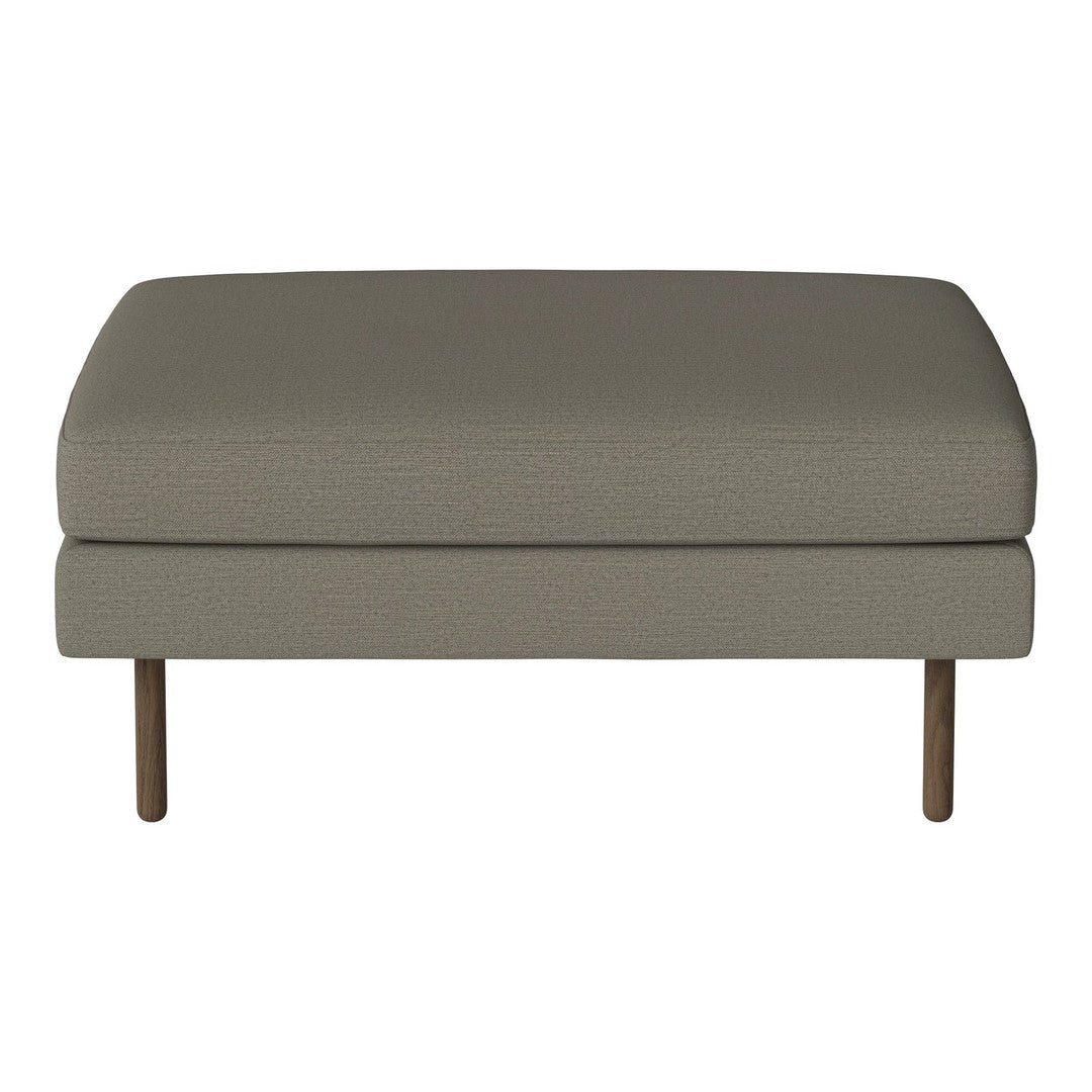 Gray upholstered ottoman with a smooth texture and minimalist design, featuring wooden legs. Perfect for modern decor.