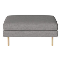 Gray upholstered ottoman with smooth fabric and natural wood legs, minimalistic design for modern decor.