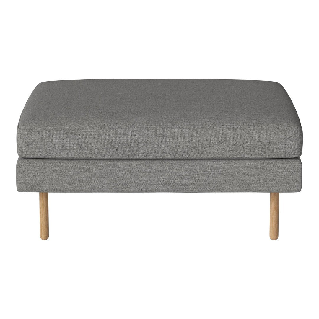 Gray upholstered ottoman with a smooth texture and light wooden legs. Stylish, minimalistic design for modern decor.